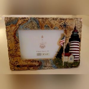Lighthouse picture frame.  Like new.
